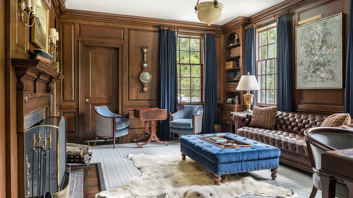 Historic wood-paneled study with fireplace and restored architectural detailing at the Sargent Road residence in Brookline, Massachusetts